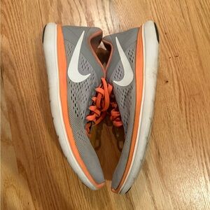 Nike Gray Sneakers with Orange Highlights